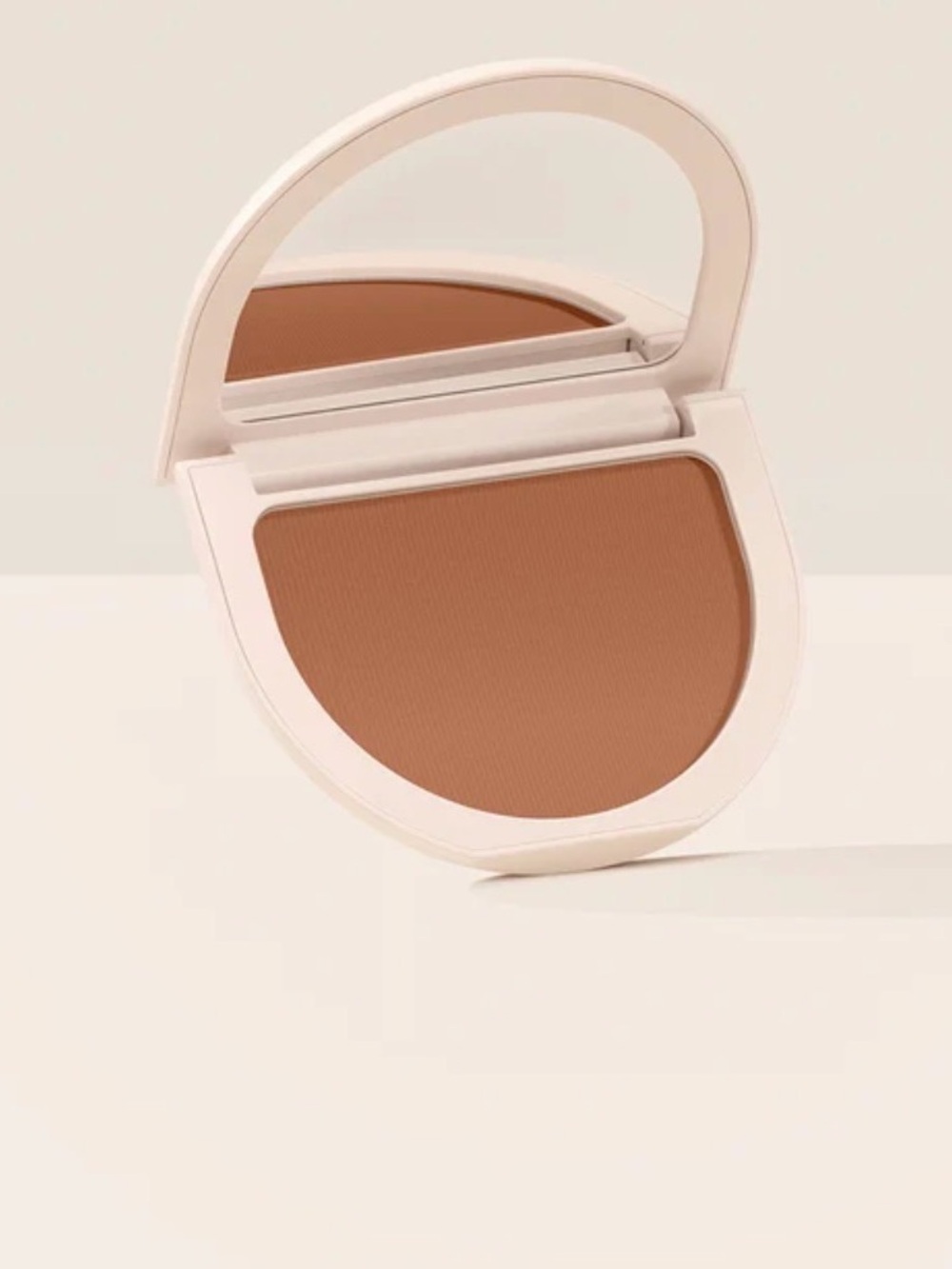 Rare Beauty True to Myself tinted pressed powder . Shade Amber